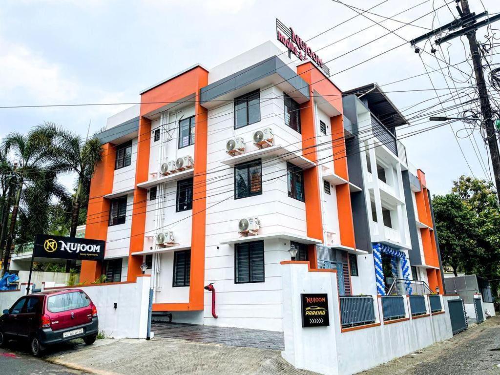 Hotel Nujoom Rooms & Apartments Kochi Екстер'єр фото